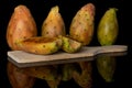 Green prickly pear isolated on black glass Royalty Free Stock Photo