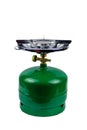 Green propane gas cylinder with burner isolated on white background