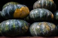 Green Pumpkins piled on top of the other