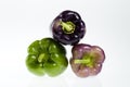 Green and purple bell peppers Royalty Free Stock Photo