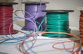 Green purple red spools of wire Royalty Free Stock Photo