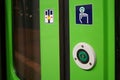 Green Push button for open the door on train`s automatic door. Royalty Free Stock Photo