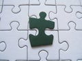 Green puzzle piece Royalty Free Stock Photo