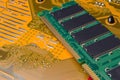 The green RAM bar is on the yellow motherboard. Royalty Free Stock Photo