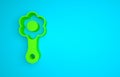 Green Rattle baby toy icon isolated on blue background. Beanbag sign. Minimalism concept. 3D render illustration Royalty Free Stock Photo