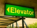 An elevator sign in a skyway Royalty Free Stock Photo