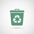 Green recycling bin icon features a simple, stylized design with a white recycling symb Royalty Free Stock Photo