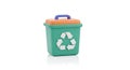 Isolated green recycling bin with orange lid and blue handle on a plain white background studio shot video 4k Royalty Free Stock Photo