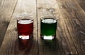 Green and red alcohol shot drinks Royalty Free Stock Photo