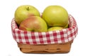 Green and red apples in a wicker wooden basket on a white background, isolate, side view, checkered napkin.