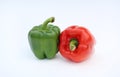 Green and red bell pepper isolated on white background Royalty Free Stock Photo