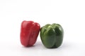 Green and red bell pepper on white background Royalty Free Stock Photo