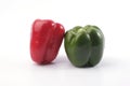 Green and red bell pepper on white background Royalty Free Stock Photo