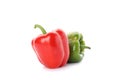 Green and red bell peppers isolated on white Royalty Free Stock Photo