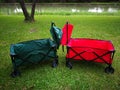 A green and a red Cart for using in camping ltravel Royalty Free Stock Photo