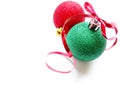 Green And Red Christmas Balls With Ribbon On A White Background.