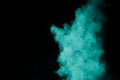 Green red color powder explosion cloud  on black background.Green red dust splash on dark background Royalty Free Stock Photo