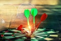 Green and Red Darts Arrow hitting on a dartboard. Royalty Free Stock Photo