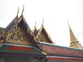 Green and red detail of roof with old architecture of thailand