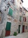 GREEN AND RED DOORS AND WINDOWS, ROVINJ, CROATIA Royalty Free Stock Photo