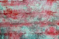 Green and red grunge aged paint wall texture Royalty Free Stock Photo