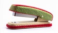 Green and Red Novelty Stapler on a White Background Office Stationery Royalty Free Stock Photo