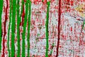 Green and red paint on a white wall abstract grunge color texture Royalty Free Stock Photo