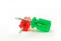 Green and red screwdriver isolated on white Royalty Free Stock Photo