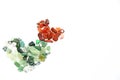 Green and red stones in heart shape isolated Royalty Free Stock Photo