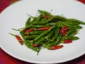 Green red Thai pepper, Chilli Padi, Capsicum annuum freshness on white plate vegetable food Royalty Free Stock Photo