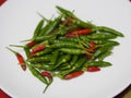 Green red Thai pepper, Chilli Padi, Capsicum annuum freshness on white plate vegetable food