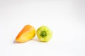 Green, red and yellow  pepper on white background. Royalty Free Stock Photo