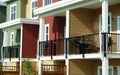 Green Red Yellow Row Houses Balconies Royalty Free Stock Photo