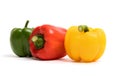 Green, red, yellow sweet bell peppers isolated on white background Royalty Free Stock Photo