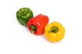 Green, red, yellow sweet bell peppers isolated on white background Royalty Free Stock Photo