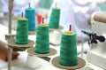 Green reels of thread at tailor's Royalty Free Stock Photo