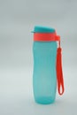 Green refillable drink bottles on white background