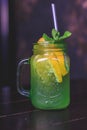 Green refreshing alcoholic drink lemonade mojito