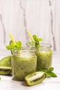 Green refreshing smoothie with kiwi, cucumber and apples Royalty Free Stock Photo