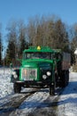 Retro Volvo truck from 1972 on snowy roads Royalty Free Stock Photo