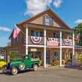 1929 green retro, vintage two door Ford pickup truck at retro general store