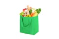 Green reusable shopping bag full of vegetables and groceries Royalty Free Stock Photo