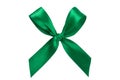 Green ribbon satin bow isolated on white background.