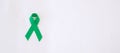 Green Ribbon for supporting people living and illness. Liver, Gallbladders bile duct, kidney Cancer and Lymphoma Awareness month