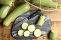 Green ripe zucchinis on wooden table, flat lay Royalty Free Stock Photo