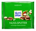Green Ritter Sport milk chocolate bar isolated on white