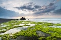 Green rocks beach at Bali, Indonesia.