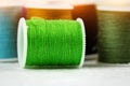 The green roll of thread on background,needlework,craft,sewing Royalty Free Stock Photo