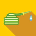 Green rolled up garden hose icon, flat style