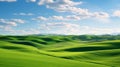 Green rolling hills of farmland wheat fields seen from the Palouse in Washington State USA